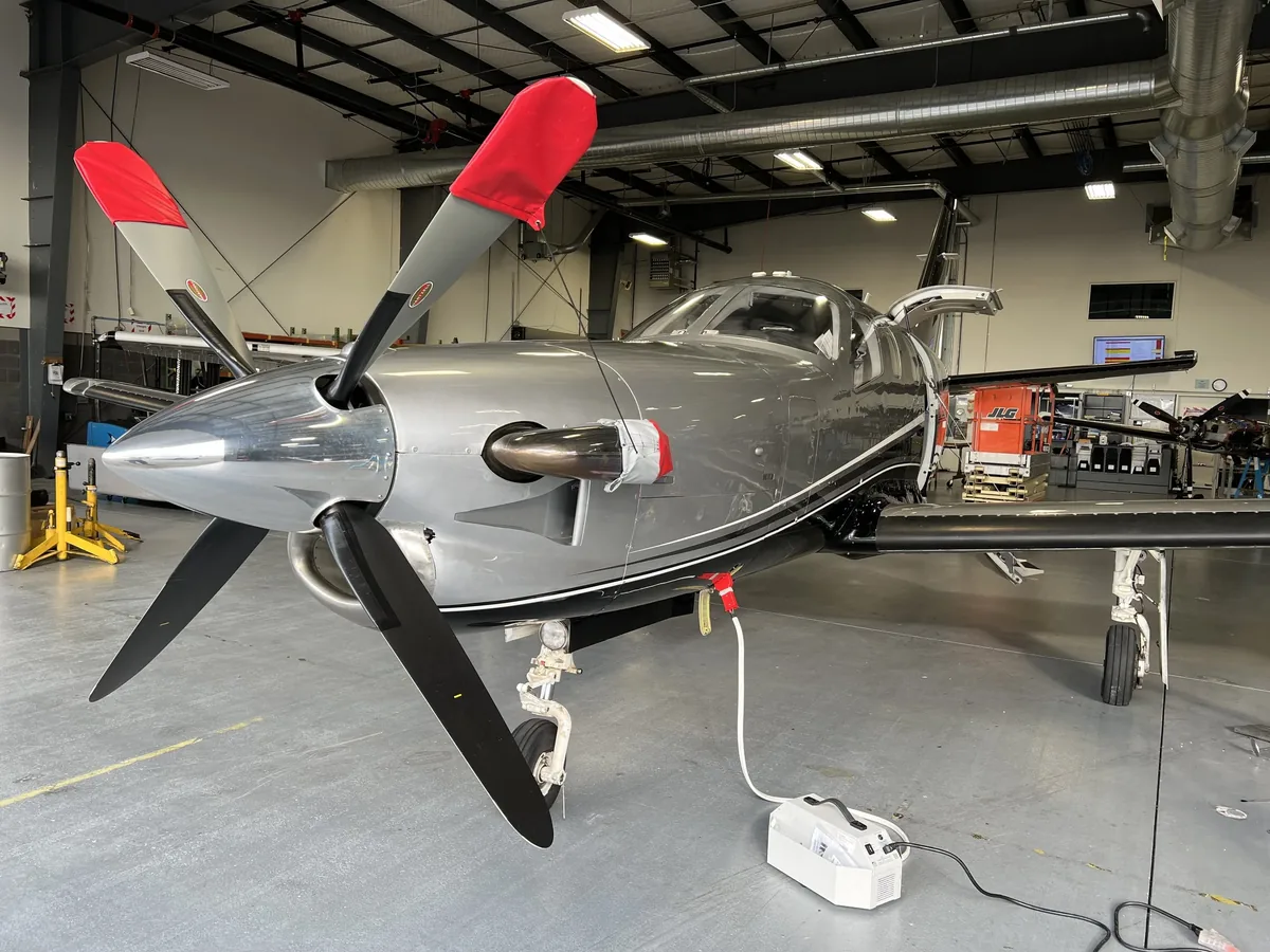 A turboprop in the hangar, being detailed