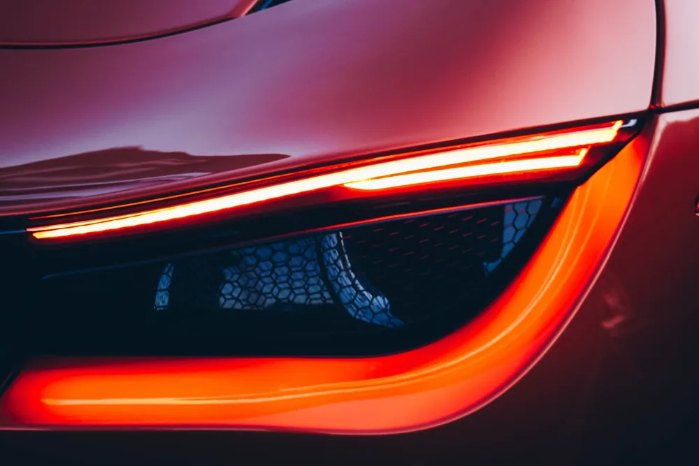 A freshly restored headlight lens, crystal clear